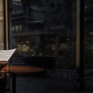 business professional reading a brochure