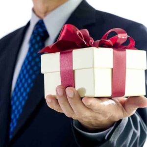 businessperson giving a gift