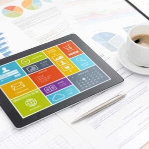 Data on a tablet with coffee