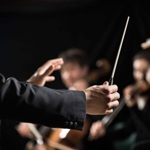 conducting an orchestra