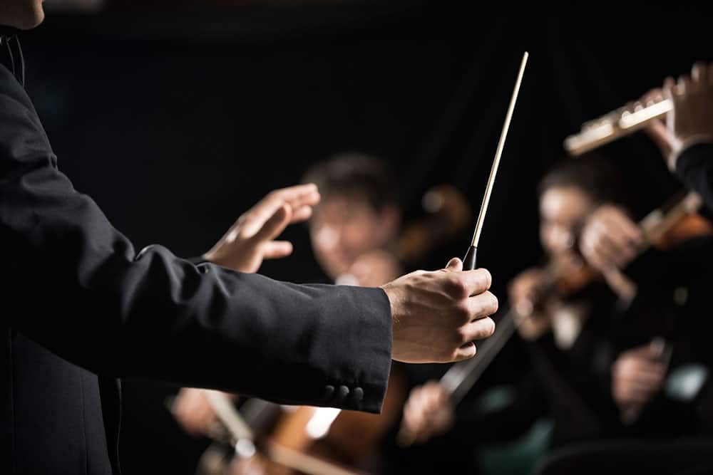 conducting an orchestra
