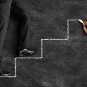 stepping stones on chalkboard